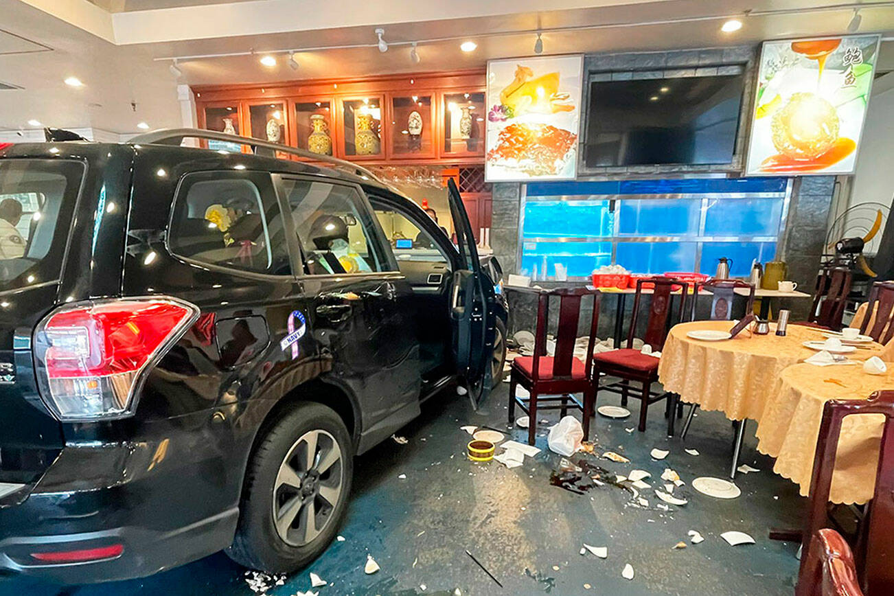 Vehicle crashes into Kent restaurant; two people injured | Update