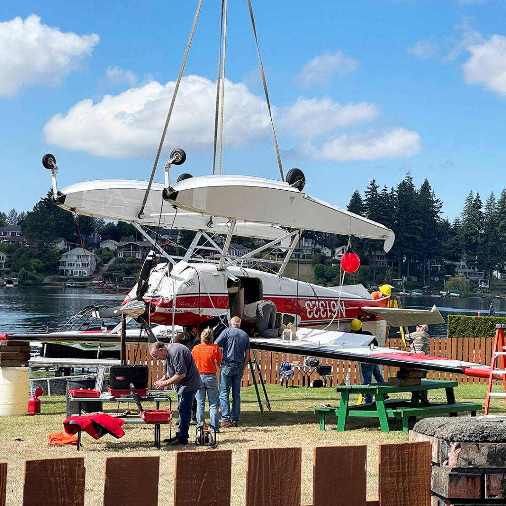 A seaplane is removed Saturday, Aug. 24 from Lake Meridian after crashing into the water. The National Transportation Safety Board is investigating the crash. COURTESY PHOTO, Puget Sound Fire