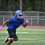 Senior Tae Redding in a full sprint during kickoff drills at French Field. Ben Ray / The Reporter