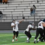 Kentlake QB Gavin Leenhiavue makes a throw at Federal Way Memorial Field. Ben Ray / The Reporter