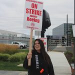Krystal Keefe strikes outside the Renton Boeing plant. Keefe has worked for Boeing for over six years. Photo by Bailey Jo Josie/Sound Publishing.