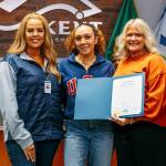 City of Kent Parks Director Julie Parascondola, left, and Mayor Dana Ralph recognize Paralympic medalist Jaleen Roberts at the Sept. 17 City Council meeting. COURTESY PHOTO, City of Kent