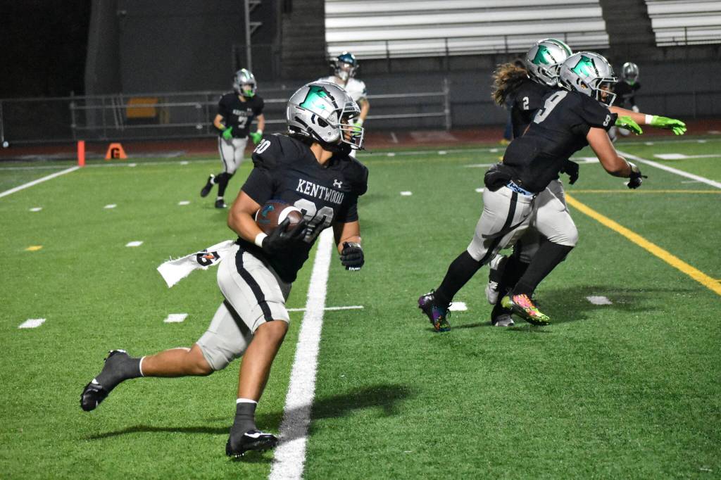 Conk safety Darian Williams intercepted a tipped pass and returns it in the fourth quarter. Ben Ray / The Reporter