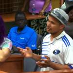 An asylum seeker, camping on property next to the former Econo Lodge, asks the Kent City Council for housing support during its June 18 meeting. SCREENSHOT, Kent City Council video