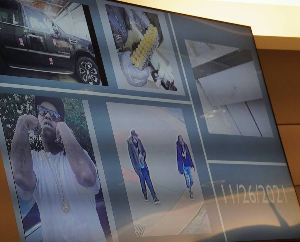 Photos of evidence presented during the defenses closing statement. Photo by Joshua Solorzano/The Mirror