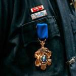 Officer Taylor Burns wears the Kent Police Department Medal of Honor. COURTESY PHOTO, Kent Police