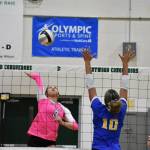 Conk sophomore Amiya Irons with a spike against Stadium. Ben Ray / The Reporter