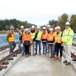 Federal Way Mayor Jim Ferrell and Sound Transit staff stand under Structure C in Kent which includes the longest light rail bridge built by Sound Transit. The bridge was completed recently and they are now moving to the next phase that focuses on the rail itself atop the bridge. KEELIN EVERLY-LANG, Sound Publishing