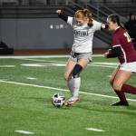 Camille Rigtrup protects the ball from a White River defender. Ben Ray / The Reporter