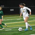 Kentridge senior Sierra Wallace dribbles the ball against Woodinville. Ben Ray / The Reporter