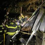 Puget Sound Fire responds Tuesday night, Nov. 19 to a tree on a trailer in the 22900 block of 184th Street in Maple Valley. Two people were in the trailer at the time. One patient was extricated in a short period of time. It took firefighters an hour to extricate the second patient. One patient was transported to a local hospital by ambulance and the second patient was transported by King County Medic One to an area hospital. COURTESY PHOTO, Puget Sound Fire