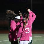 Three Chargers all dance after Shiney Mayanja scored her first goal of the night, Kentridges fifth. Ben Ray / Sound Publishing
