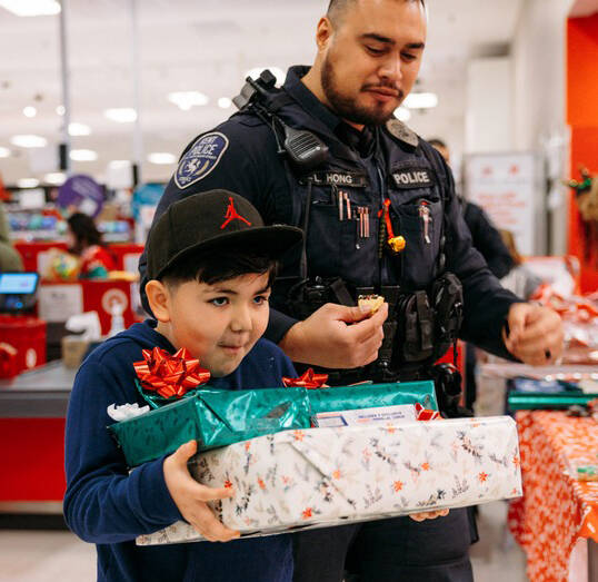 Fifty children participated in the 11th Shop with a Cop on Saturday, Dec. 7 at the Kent Target store. COURTESY PHOTO, Kent Police