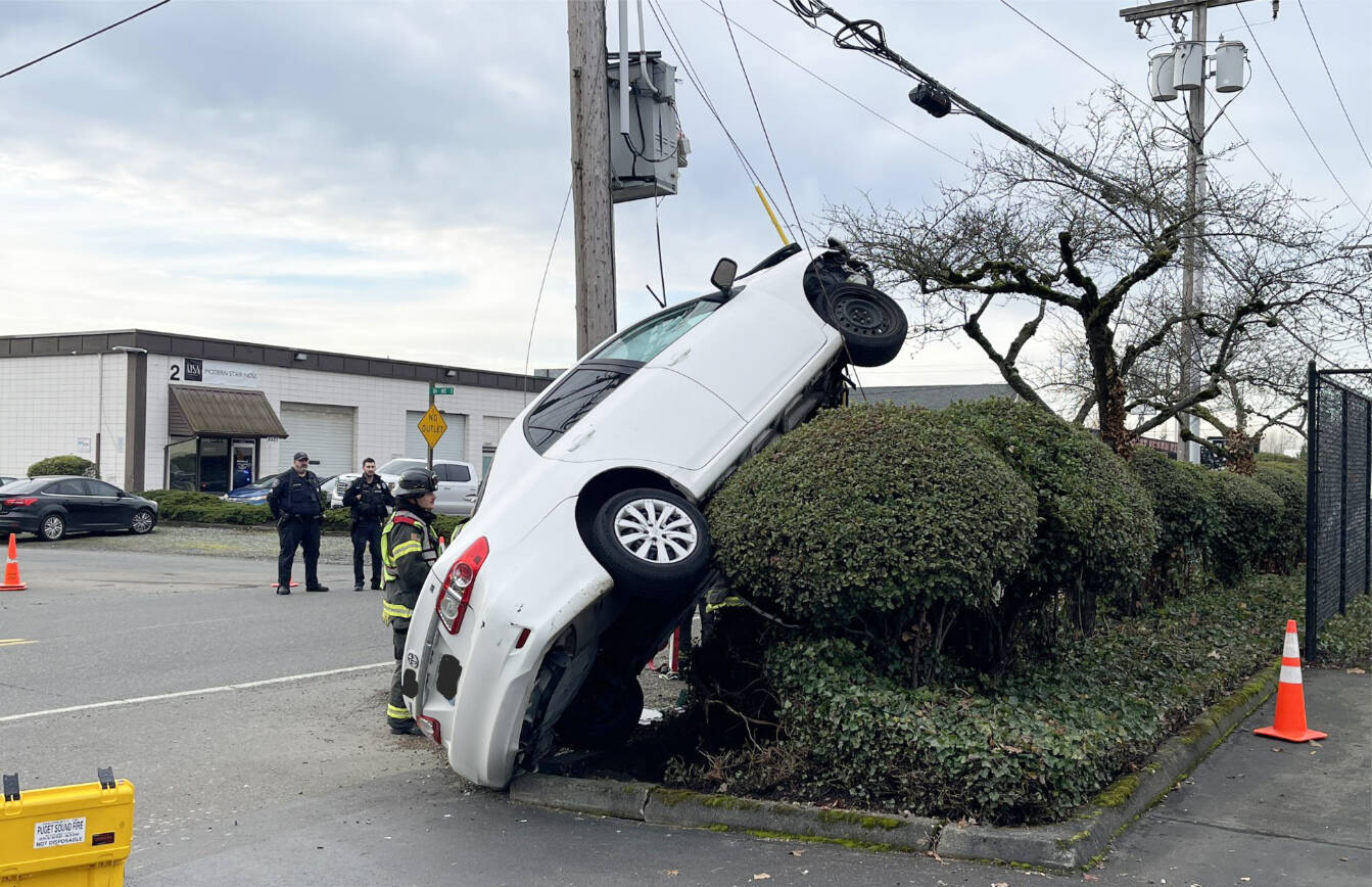 A driver suffered minor injuries after crashing into a pole Wednesday morning, Dec. 11 in the 8600 block of South 228th Street. COURTESY PHOTO, Puget Sound Fire