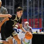 Brandon Tagle drives to past a Grizzly defender. Ben Ray / The Reporter