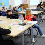Photo by Keelin Everly-Lang / the Mirror
Students eat breakfast in the classroom at Lake Grove Elementary School on Jan. 17 as part of a program that launched this year.