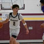 Brandon Tagle dribbling the basketball against Sumner. Ben Ray / The Reporter