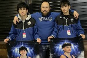 Adonai (left), Jerry and Luke (right) take a photo after the state tournament. Photo provided by Jerry Garza