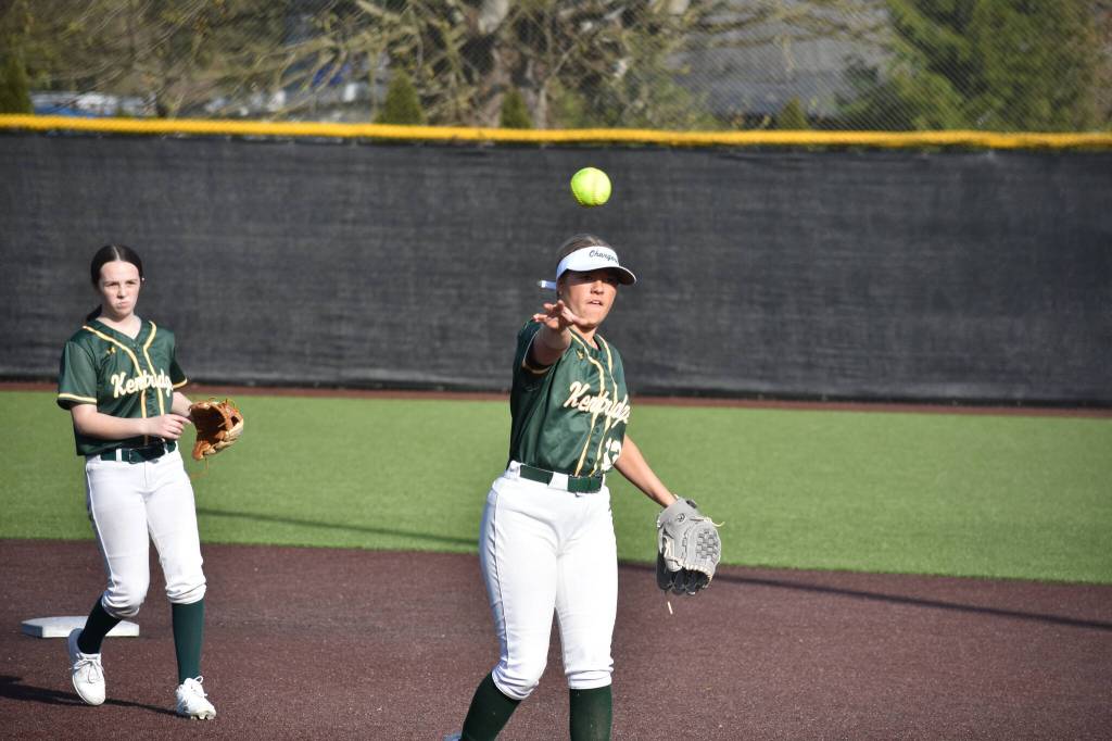Makenna Bennett throws the ball to field after fielding a ground ball. Ben Ray / The Reporter