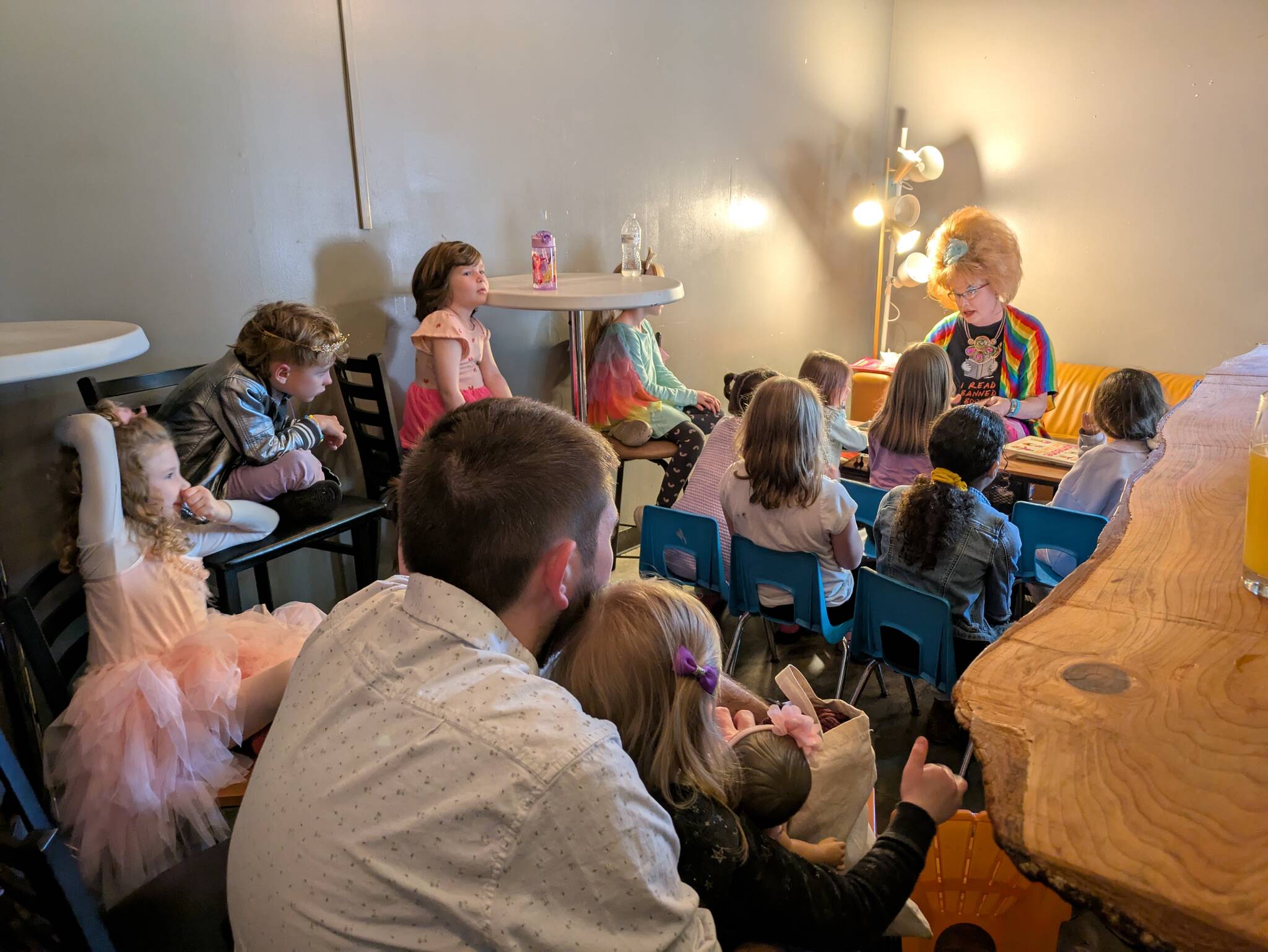 Sylvia OStayformore reads a story to families.