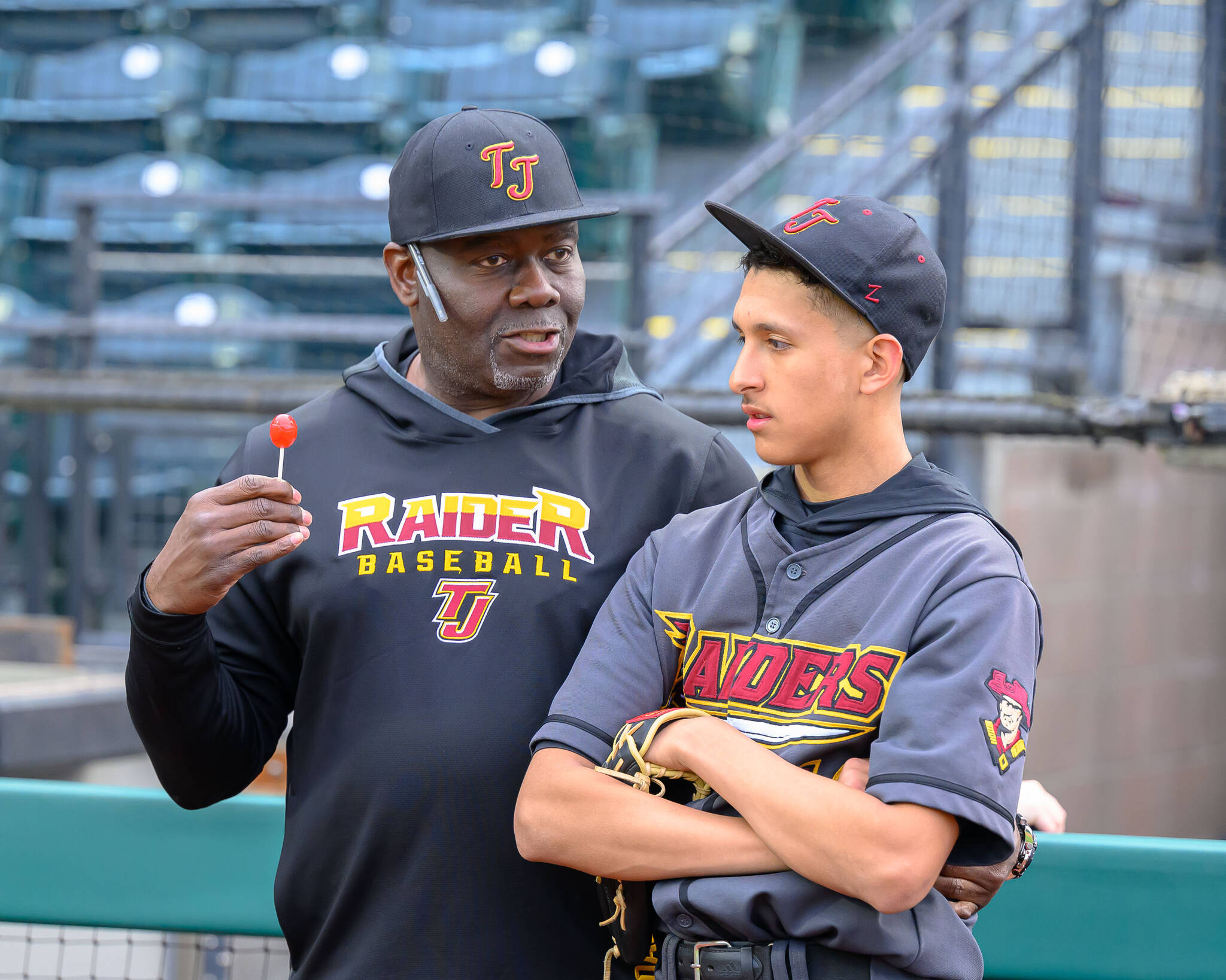 Photo by Dee Torres
Joe Townsend and a young Raider pitcher discuss tactics at Cheney Stadium.