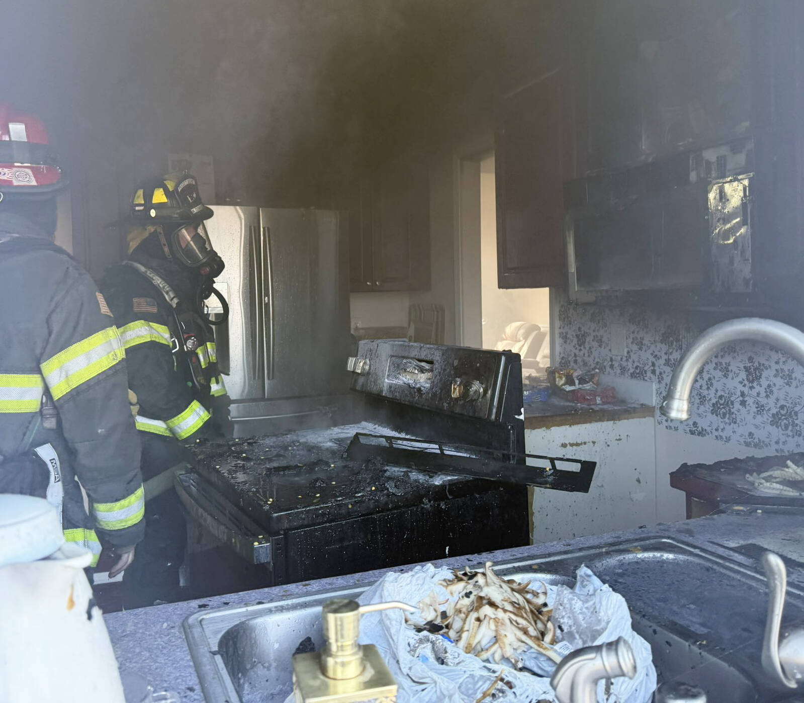 A stovetop fire from a burner left on damages a kitchen May 5 at a Kent home in the 20100 block of 102nd Avenue SE. COURTESY PHOTO, Puget Sound Fire