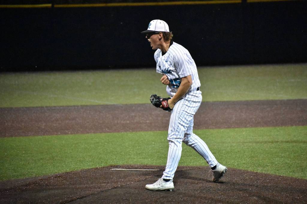 Cameron Bain lets a yell after ending the game against Kentwood. Ben Ray / The Reporter