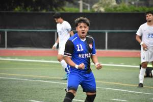 Anthony Diaz celebrates the games winning goal. Ben Ray / The Reporter