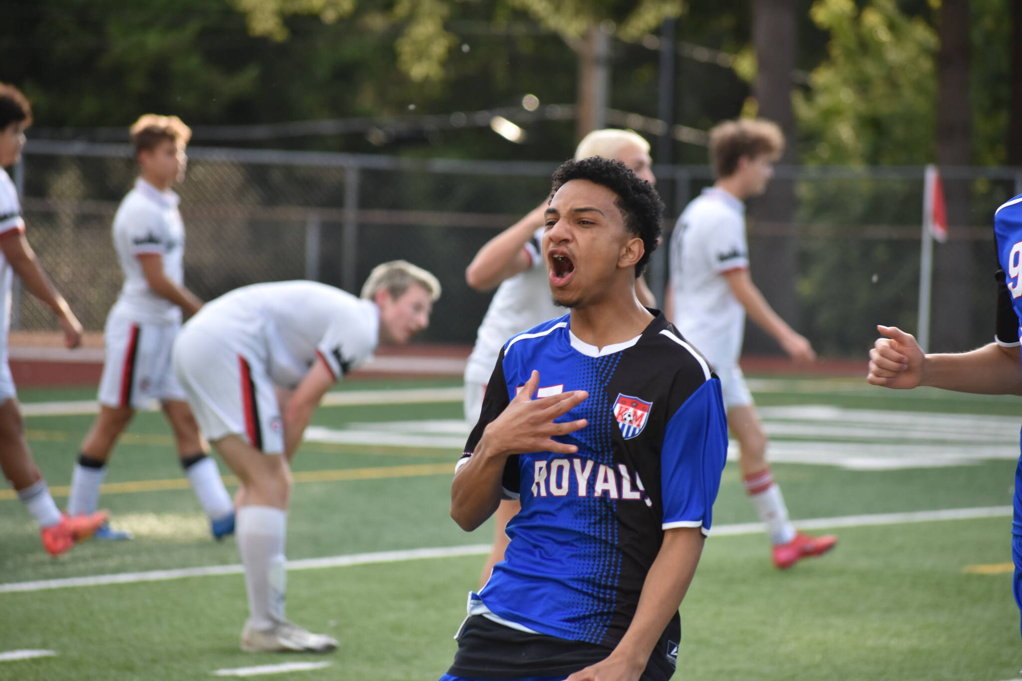 Johan Zuluaga shouts after scoring the first goal of the game. Ben Ray / The Reporter