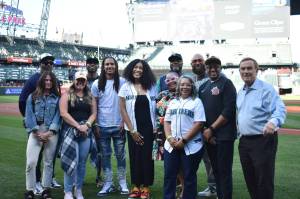 Mohagani Townsend (middle) stands with family and friends along with King County Councilmember Pete von Reichbauer (at far right) on May 28 at T-Mobile Park. Ben Ray / Sound Publishing