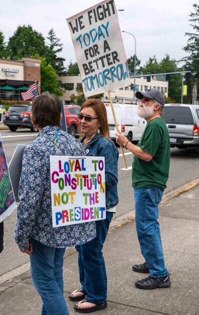Many signs were spotted by drivers along SE 272nd Street in Covington. COURTESY PHOTO, Indivisible Covington WA
