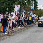 People line SE 272nd Street in Covington. COURTESY PHOTO, Indivisible Covington WA
