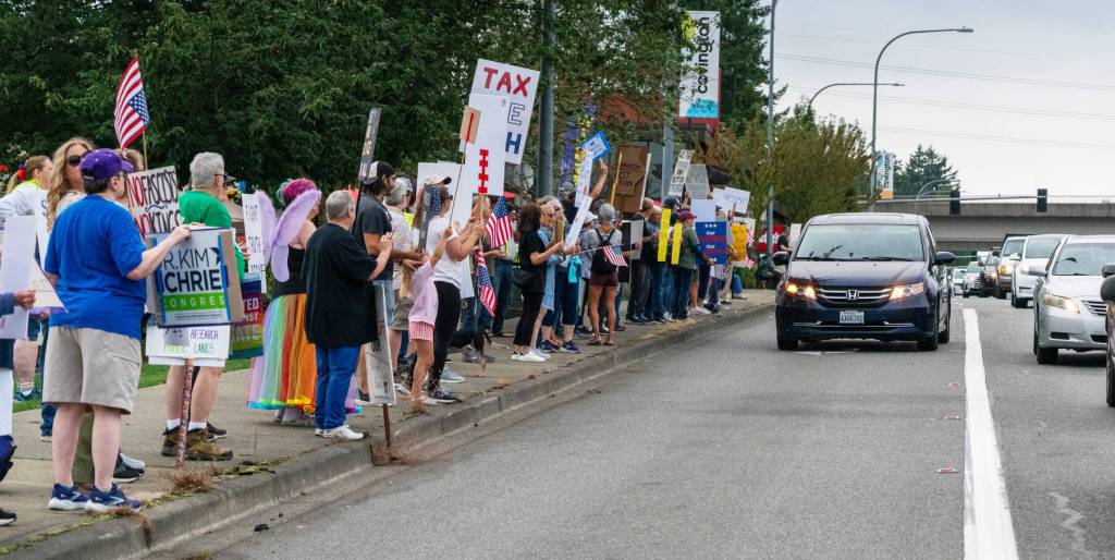 People line SE 272nd Street in Covington. COURTESY PHOTO, Indivisible Covington WA