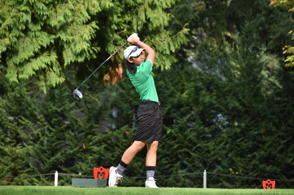 Zoie Pathammavong-Sakda tees off at Meridian Valley Country Club. Ben Ray / The Reporter