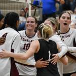 Kentlake celebrates winning a point against Auburn Mountainview. Ben Ray / The Reporter