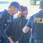 Kent Police make an arrest last week at the Safeway at Kent-Kangley Road and 132nd Avenue SE as part of a shoplifting sting. COURTESY PHOTO, Kent Police