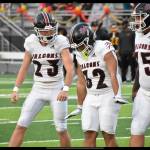 Makaio Villarin (32) does the waddle touchdown celebration after scoring for Kentlake. Ben Ray / The Reporter