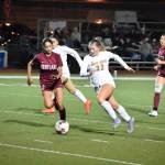 Jordyn Daigle and Isabella Cabaccang chase the ball for Kentlake and White River. Ben Ray / Sound Publishing