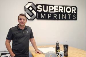 Joe Simmons purchased Superior Imprints in 2020. Now located in Kent, the company helps businesses promote their brands with apparel, drinkware and other products. Courtesy Comcast