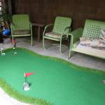 Two residents like to play mini golf so a small green was put in one of the facilitys sun rooms. Photo by Bailey Jo Josie/Sound Publishing.
