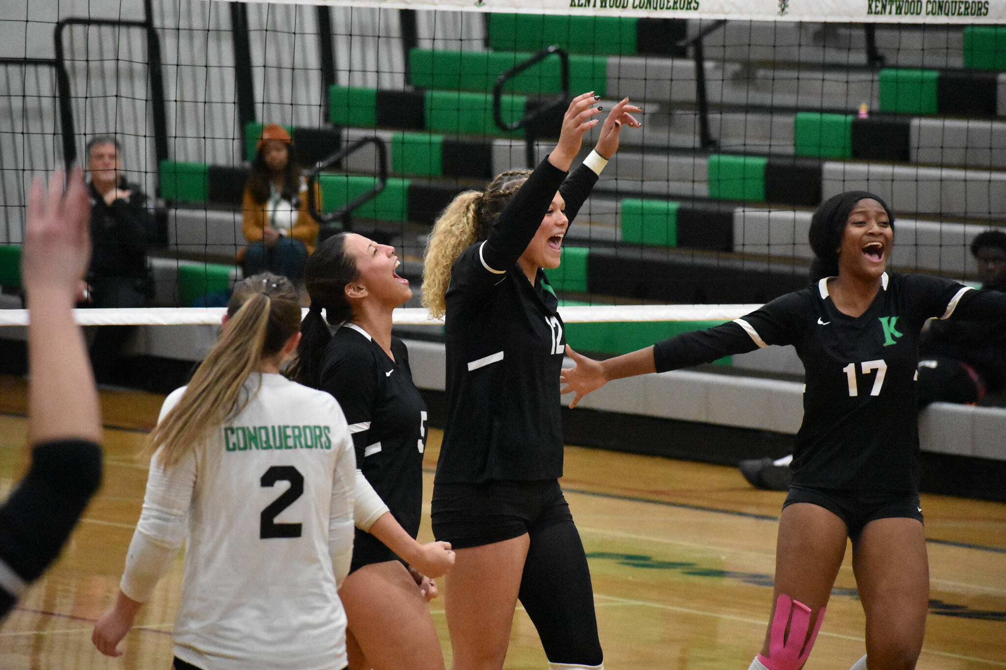 Kentwood celebrates the win over Kentridge on senior night. Ben Ray / The Reporter