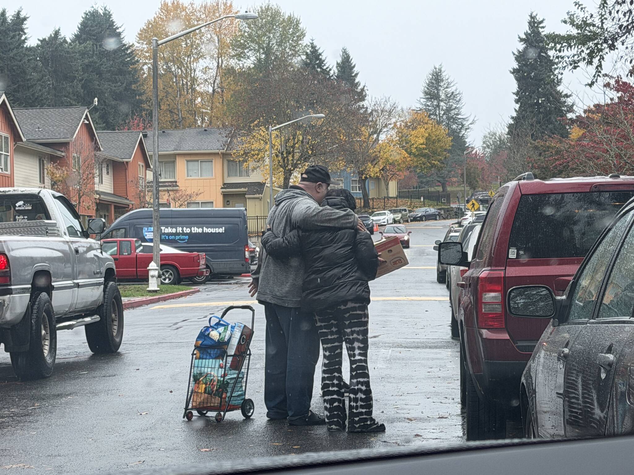 A scene at the Kent Food Bank at the Birch Creek apartment complex. Photo by Mariah Hill