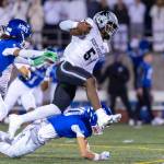 Marquise Jones leaps over a Curtis defender for Kentwood. Photo provided by Robby Mullikin