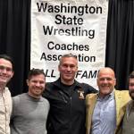 Smith (brown jacket) honored at Washington State Wrestling Coaches Hall of Fame. Courtesy of Chris Kunzelman.