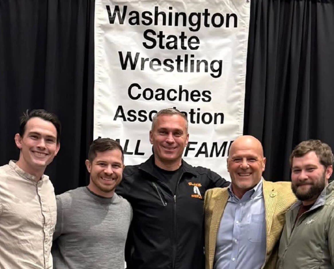 Smith (brown jacket) honored at Washington State Wrestling Coaches Hall of Fame. Courtesy of Chris Kunzelman.
