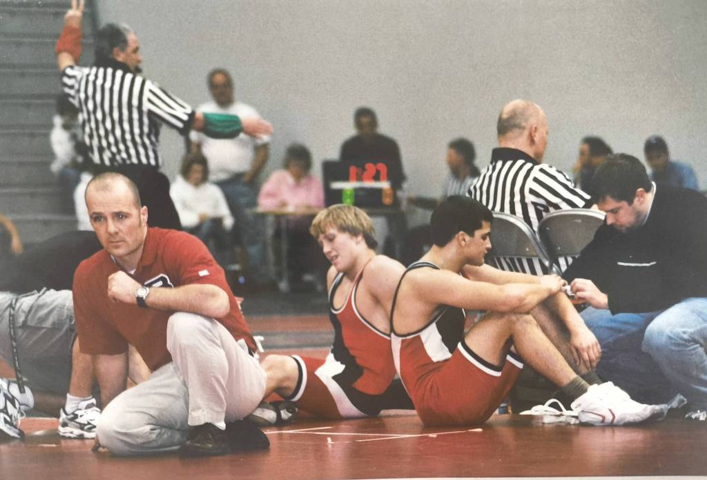 Brain Smith mat side at Bellingham High School. Courtesy of Chris Kunzelman.