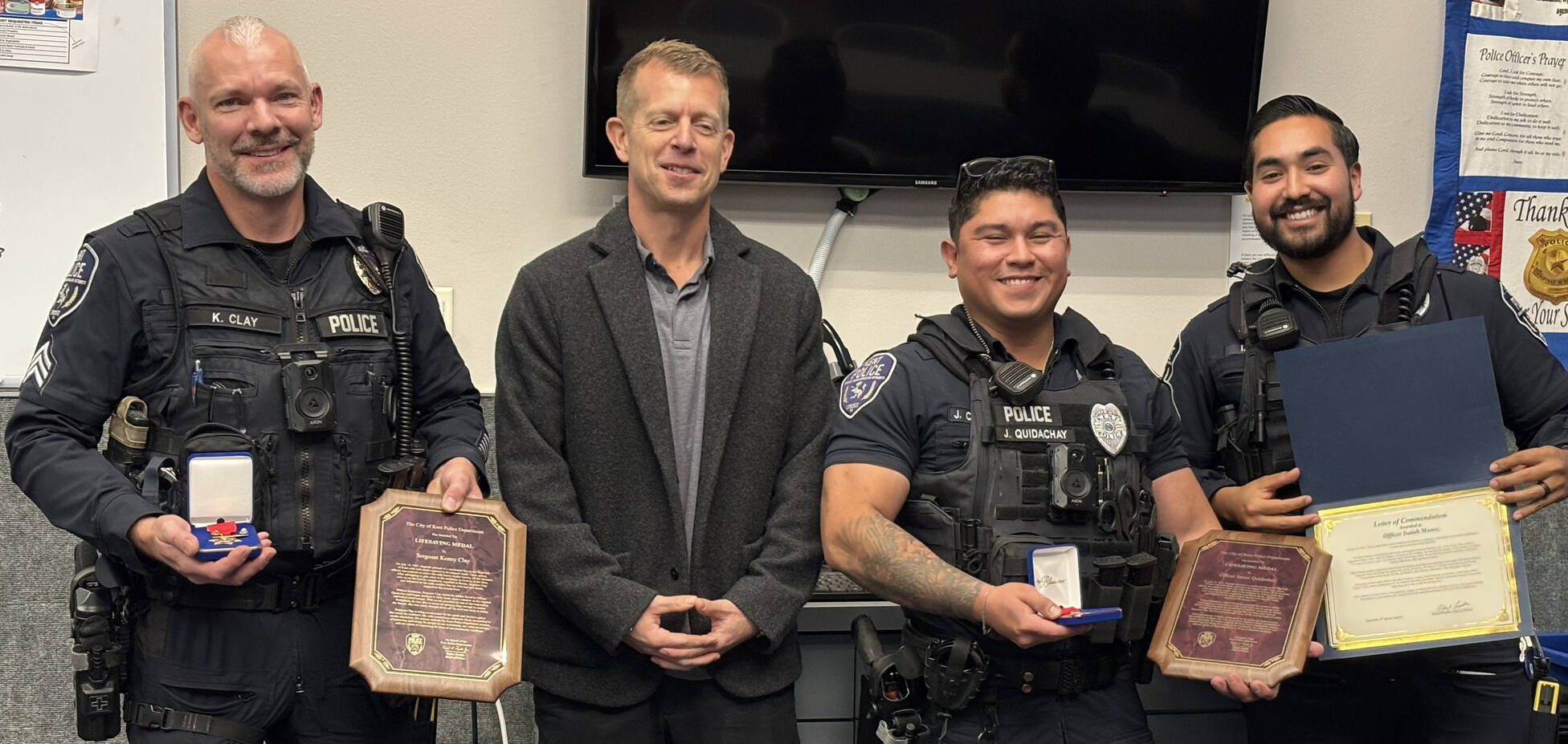 From left to right: Sgt. Kenny Clay, Assistant Chief Andy Grove, Officer James Quidachay and Officer I. Munoz. COURTESY PHOTO, Kent Police