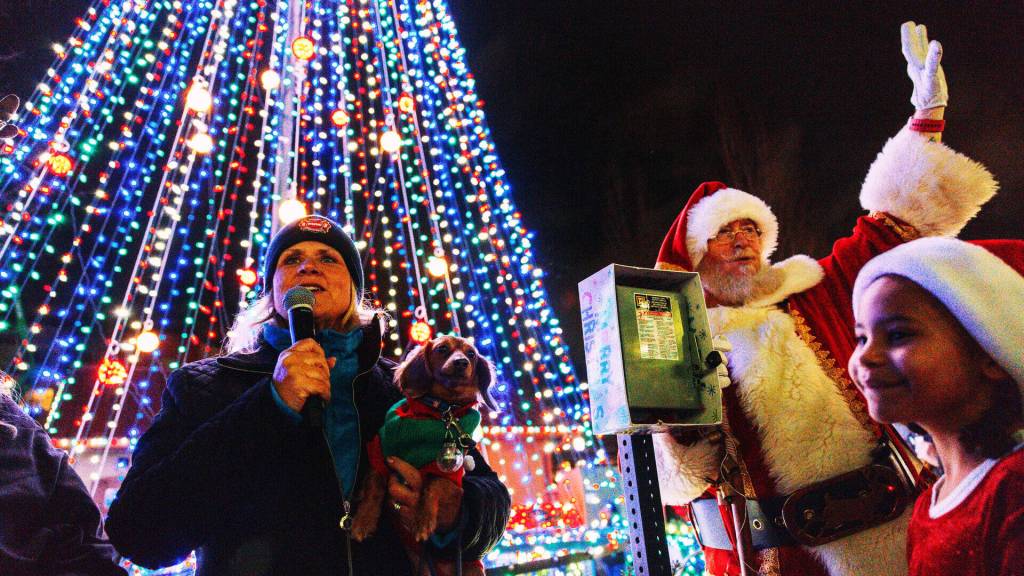 Kent Mayor Dana Ralph joins Santa to light up the tree. COURTESY PHOTO, City of Kent