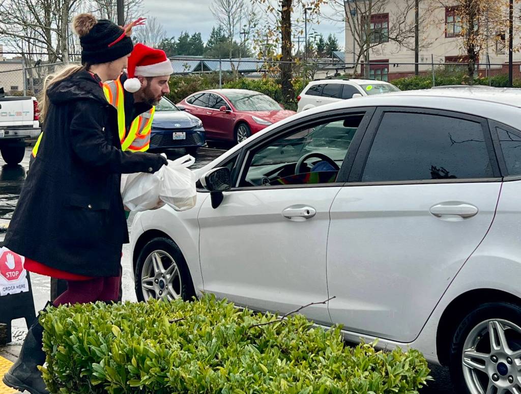 People drove up to get the free meals. COURTESY PHOTO, Nanas Southern Kitchen