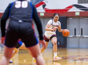 Ramiyah Bacani dibbles the basketball for Kentlake. Photo provided by Robby Mullikin